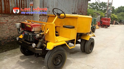 máy trộn bê tông tự cấp liệu